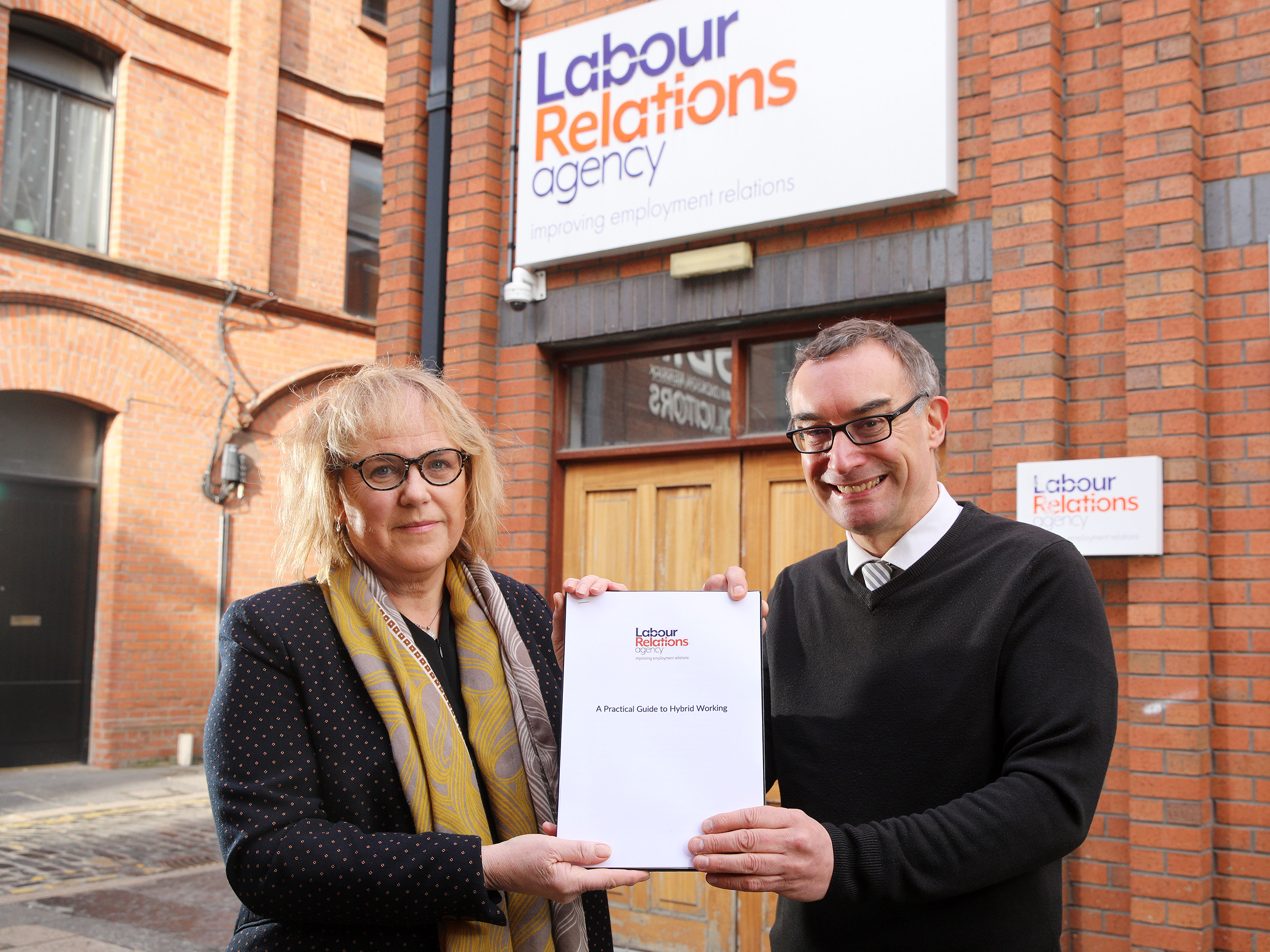 Photo of CEO Don Leeson and Employment Relations Manager Patricia Coulter launching the LRA's Hybrid Working guidance